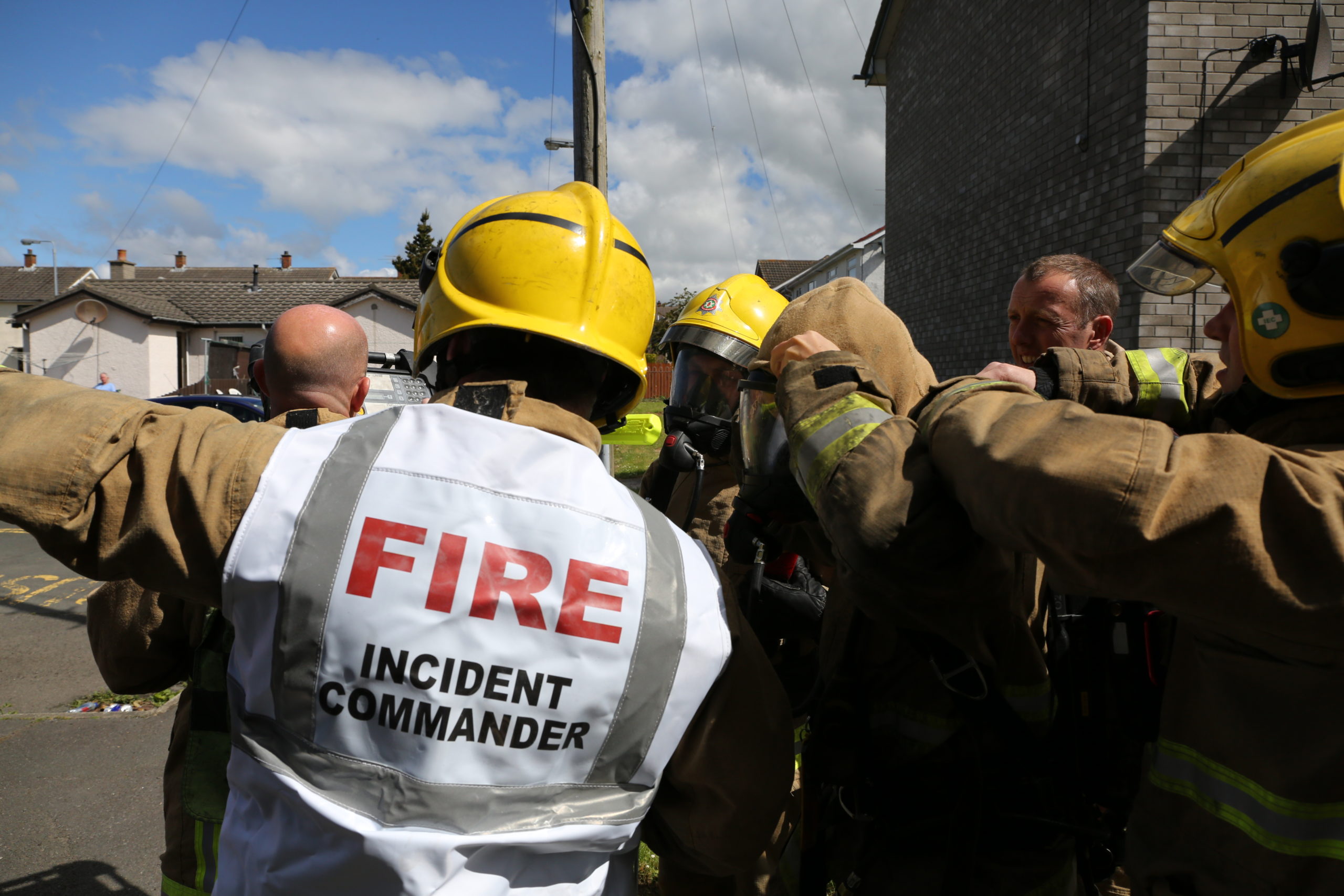 Firefighters and Incident Commander at an incident.