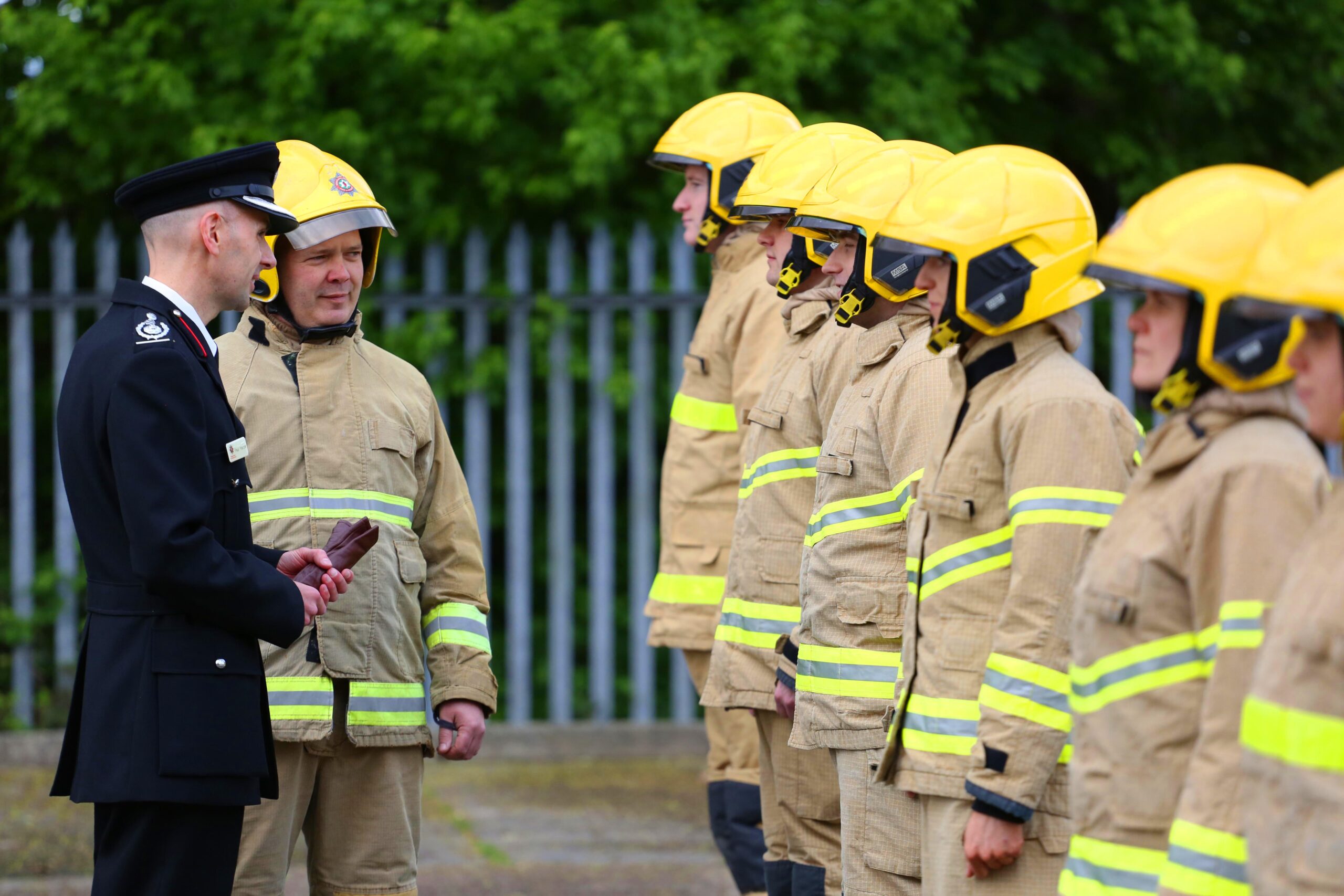 Deputy Chief Fire Officer Harper talking to Trainee Firefighters on parade