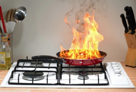 This is an image of a frying pan on fire