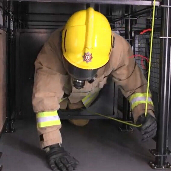 Firefighter in Breathing Apparatus in a confined space