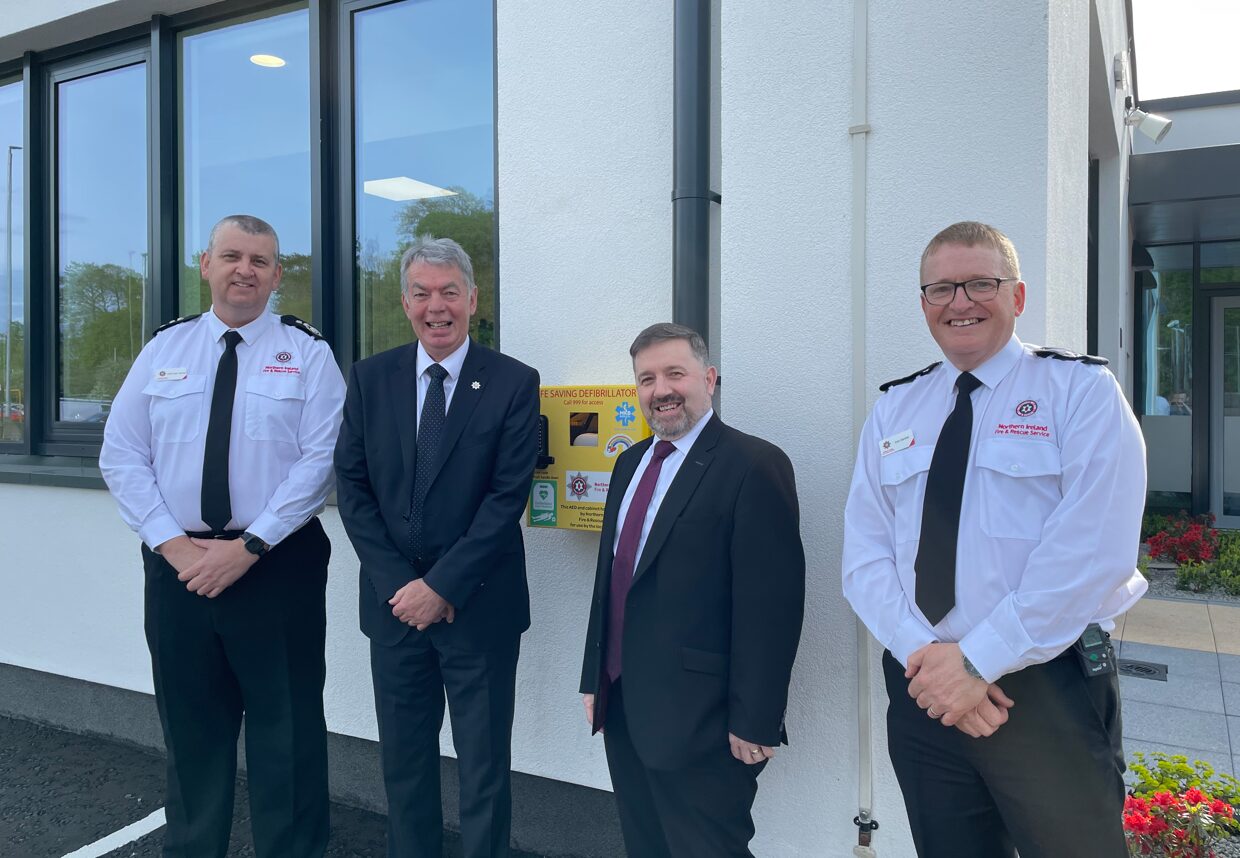 Health Minister Robin Swann visiting Antrim Fire Station to mark all NIFRS stations being fitted with life-saving defibrillators.